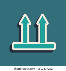 Green This side up icon isolated on blue background. Two arrows indicating top side of packaging. Cargo handled so these arrows always point up. Long shadow style. Vector Illustration