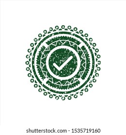 Green tick icon inside distress rubber grunge seal