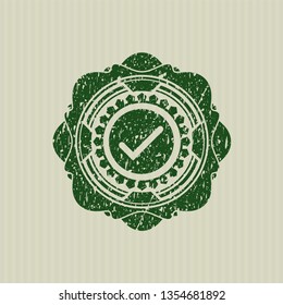 Green tick icon inside distressed grunge seal