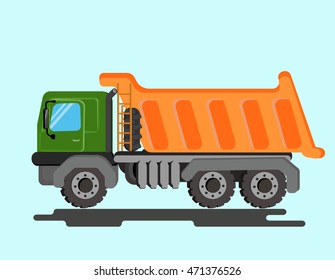 Green tipper.Tip truck construction site.