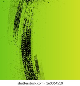 Green tire track background with ink splash. eps10