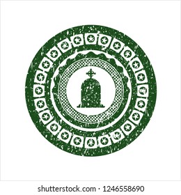 Green tombstone icon inside distressed rubber stamp