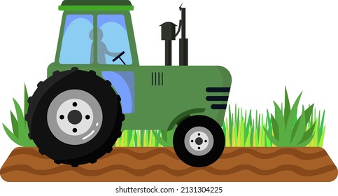 Green tractor in the field