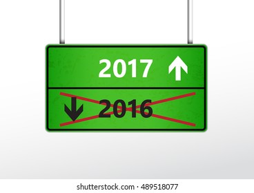 Green traffic sign with upcoming 2017 and cross out 2016 year with arrows.