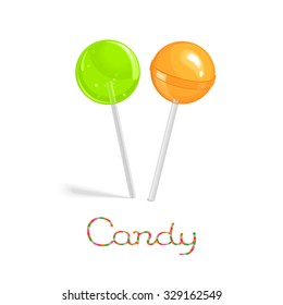 Green transparent and orange glossy lollipops on the stick isolated on white background