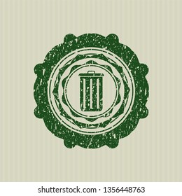 Green trash can icon inside distress rubber grunge stamp