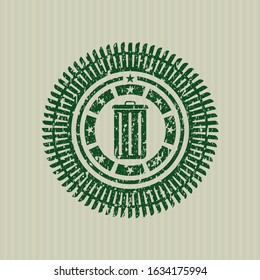 Green trash can icon inside distressed grunge stamp