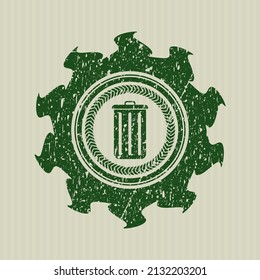 Green trash can icon inside distressed rubber grunge texture stamp. 