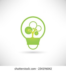 green tree growing in a bulb, go green concept