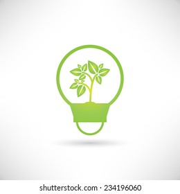 green tree growing in a bulb, go green concept
