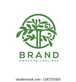green tree with leaves logo. herbal leaf circle