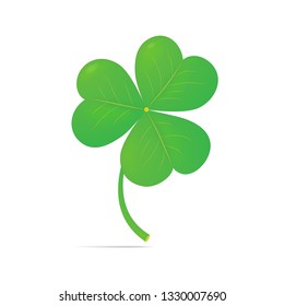 Green trefoil with a slight shadow. Isolated on a white background. The symbol of Ireland.