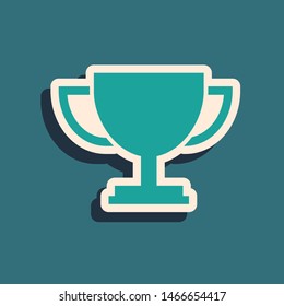 Green Trophy cup icon isolated on blue background. Award symbol. Champion cup icon. Long shadow style. Vector Illustration