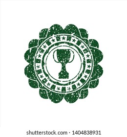 Green trophy icon inside distressed rubber seal
