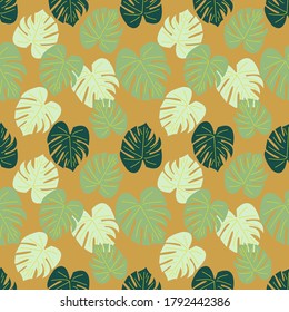 green tropical leaves. Seamless graphic design with amazing palms. Fashion, interior, wrapping, packaging suitable,fabric.textil