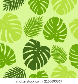 Green tropical leaves vector seamless pattern.