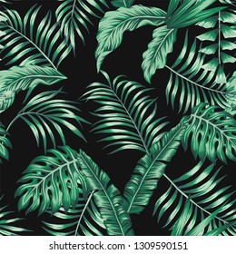 Green tropical palm banana leaves seamless vector pattern on the black background