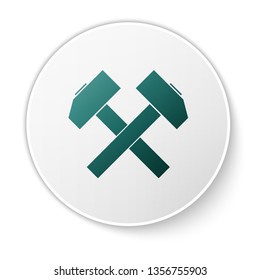Green Two crossed hammers icon isolated on white background. Tool for repair. White circle button. Vector Illustration