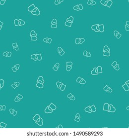 Green Two Linked Hearts icon isolated seamless pattern on green background. Romantic symbol linked, join, passion and wedding. Valentine day symbol.  Vector Illustration