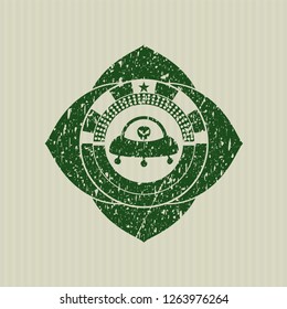 Green ufo with aline inside icon inside distressed rubber seal