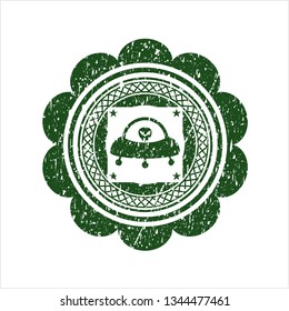 Green ufo with aline inside icon inside rubber texture