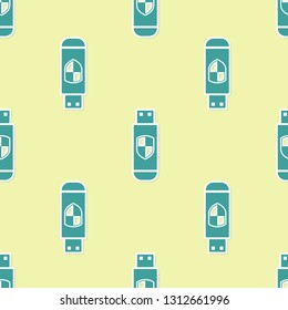 Green USB flash drive and protection shield icon isolated seamless pattern on yellow background. Flat design. Vector Illustration