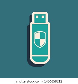Green USB flash drive and protection shield icon isolated on blue background. Long shadow style. Vector Illustration