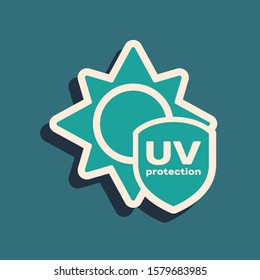 Green UV protection icon isolated on blue background. Sun and shield. Ultra violet rays radiation. SPF sun sign. Long shadow style. Vector Illustration