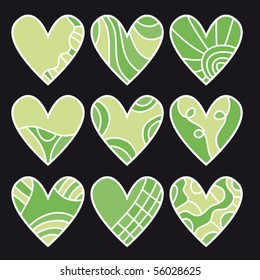 Green vector heart collection over black background