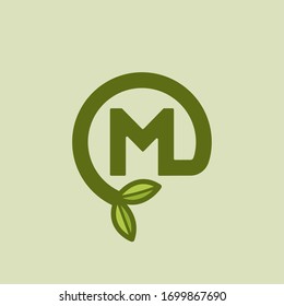 Letra verde vectorial plantada M. M Diseño de letra redonda.