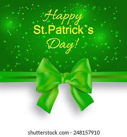 Green vector Saint Patrick's Day greeting card with bow and ribbon