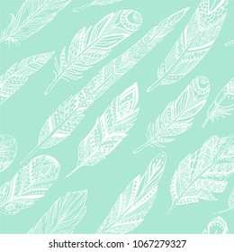 Green Vector Seamless pattern with ethnic feathers. Tribal Feathers Vintage Pattern. Hand Drawn Doodles.