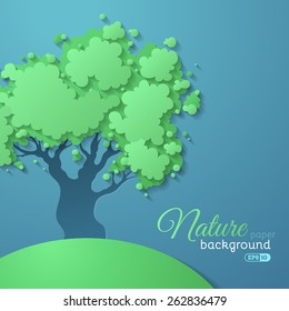 Green vector tree on blue paper background. There is place for text.