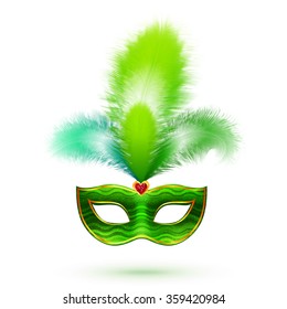 Green venetian carnival vector mask with feathers isolated on white background