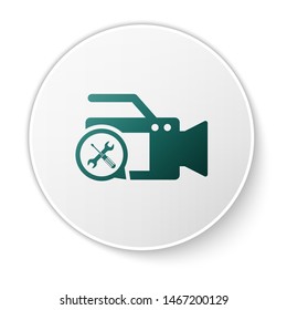 Green Video camera with screwdriver and wrench icon isolated on white background. Adjusting, service, setting, maintenance, repair, fixing. White circle button. Vector Illustration