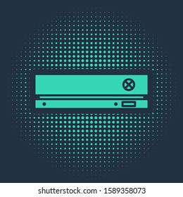 Green Video game console icon isolated on blue background. Abstract circle random dots. Vector Illustration