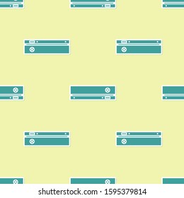 Green Video game console icon isolated seamless pattern on yellow background.  Vector Illustration