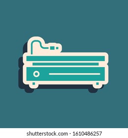Green Video game console icon isolated on blue background. Long shadow style. Vector Illustration