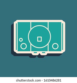 Green Video game console icon isolated on blue background. Long shadow style. Vector Illustration