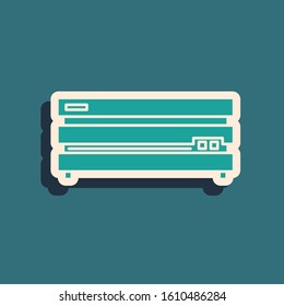 Green Video game console icon isolated on blue background. Long shadow style. Vector Illustration