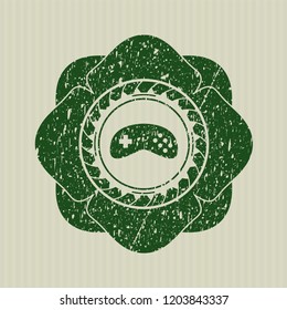 Green video game icon inside distress grunge seal