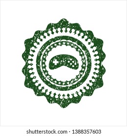 Green video game icon with rubber seal texture