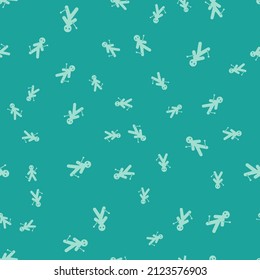 Green Voodoo doll icon isolated seamless pattern on green background.  Vector Illustration