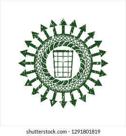 Green wastepaper basket icon inside distressed grunge seal