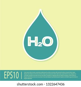 Green Water drop with H2O icon isolated on yellow background. Water formula. Flat design. Vector Illustration