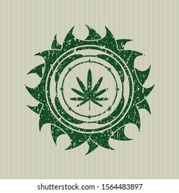 Green weed leaf icon inside rubber texture