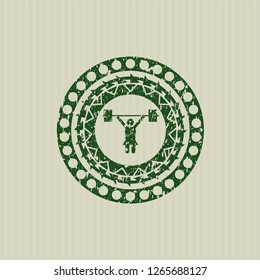 Green weightlifter girl icon inside distressed rubber grunge texture seal