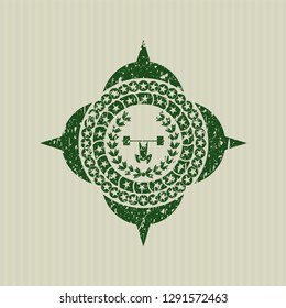 Green weightlifting inside of crown icon inside distressed rubber texture