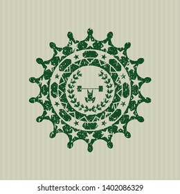 Green weightlifting inside of crown icon inside distressed grunge seal