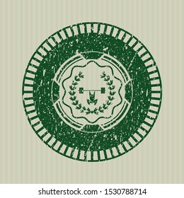 Green weightlifting inside of crown icon inside distressed rubber grunge texture stamp